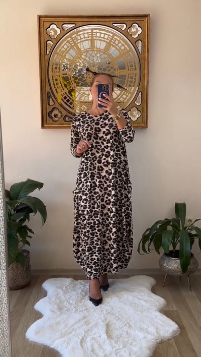 Vestido de algodón elástico con estampado de leopardo y grandes bolsillos